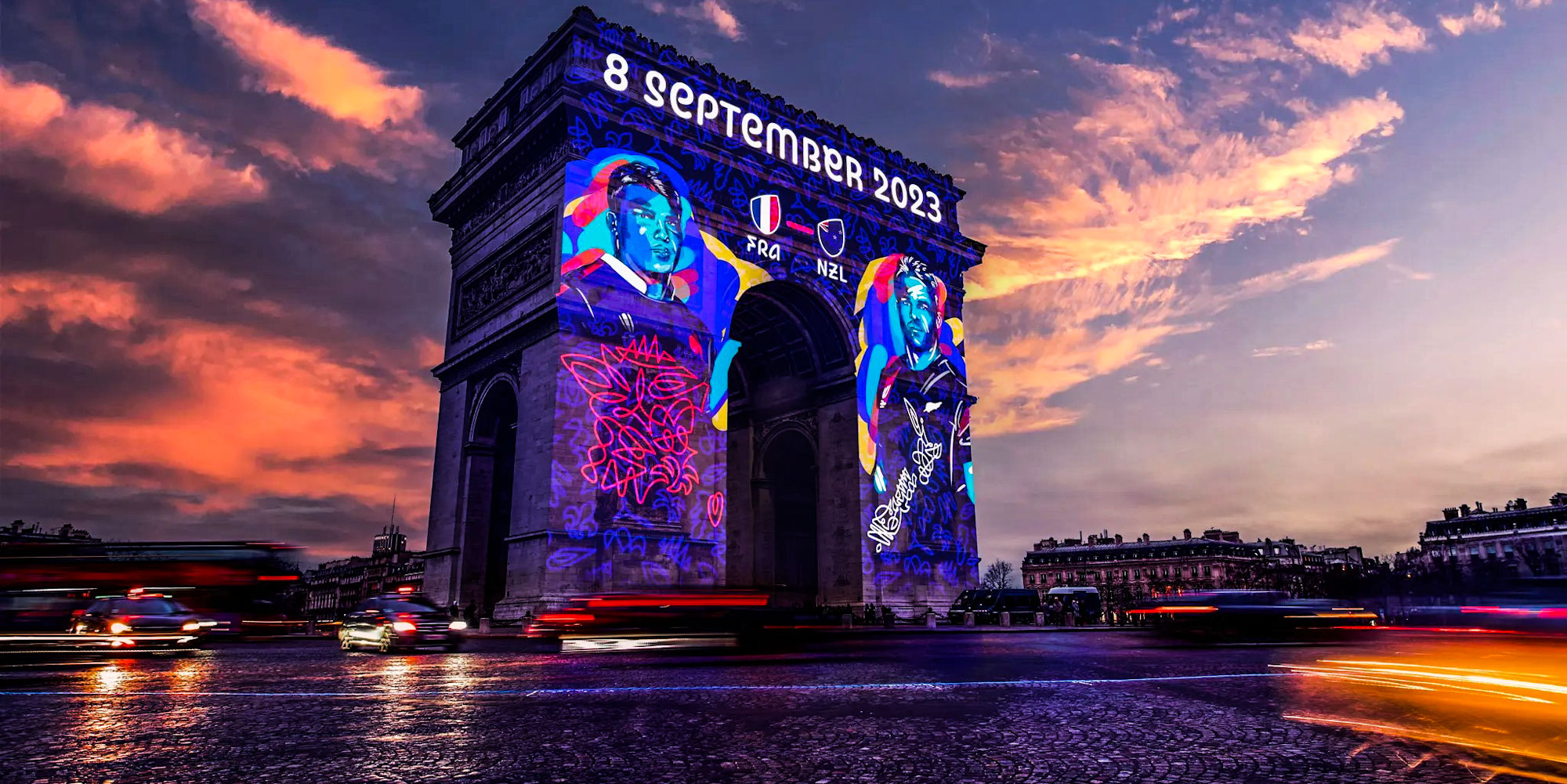 The famous Arc de Triomphe in Paris is lit up by the colours of France and New Zealand, who face off in the opening game of RWC 2023 on 8 September.