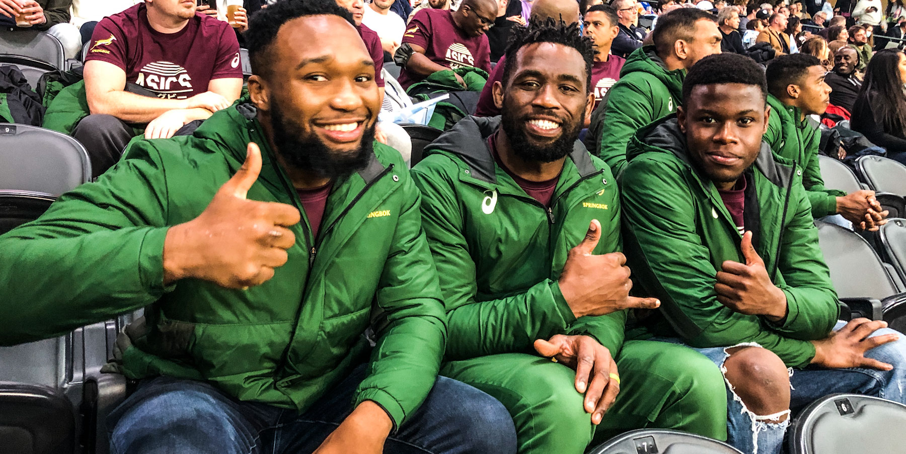 Lukhanyo Am, Siya Kolisi and Aphelele Fassi enjoy watching a French club game with the rest of the Bok squad on Saturday.