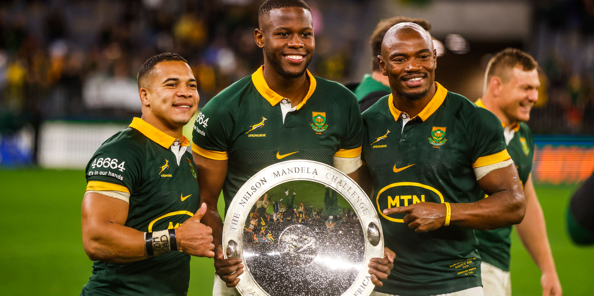 The Springbok speedsters celebrate with some silverware.