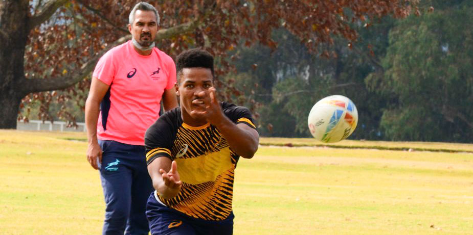 Angelo Davids with coach Neil Powell in the background.