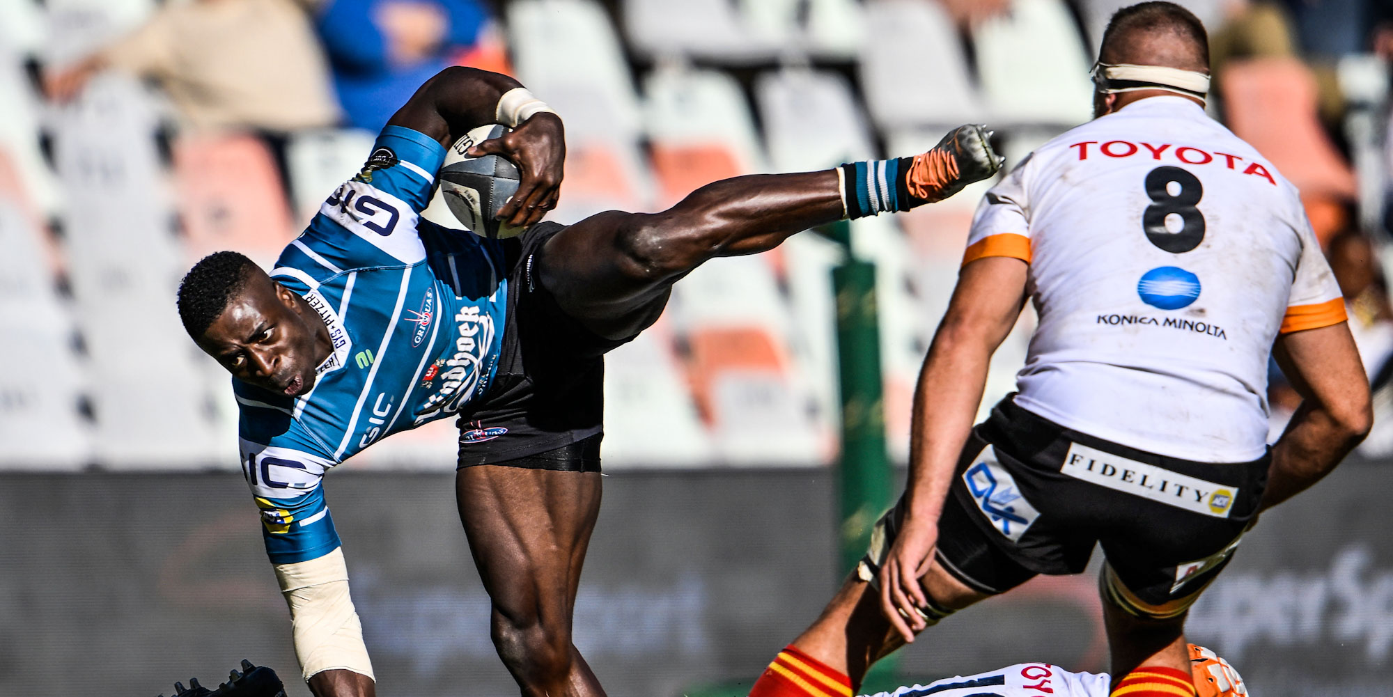 Luther Obi tries to keep his balance in the clash in Bloem.