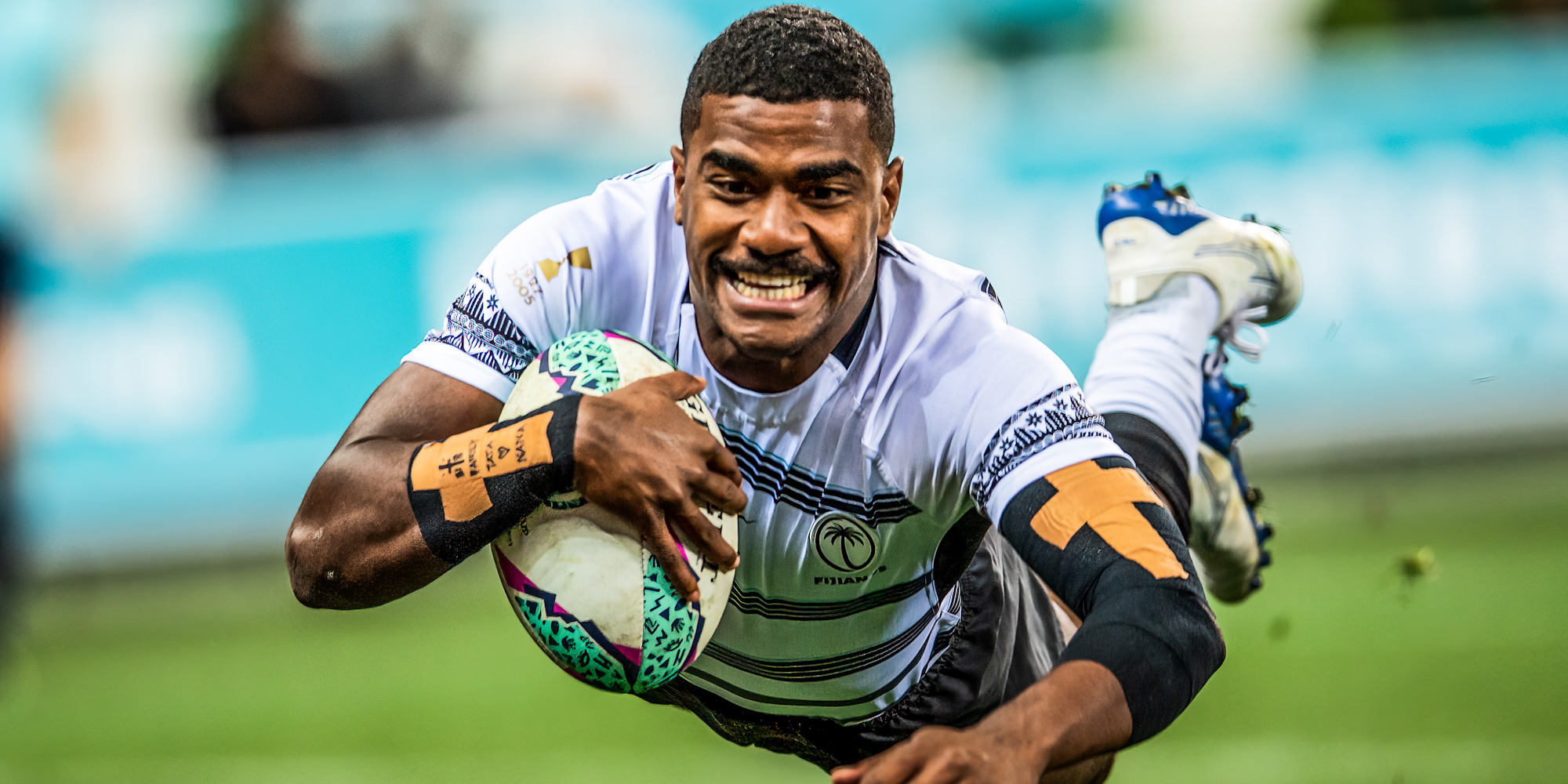Pilipo Bukayaro goes over for Fiji's last try in the final against New Zealand.