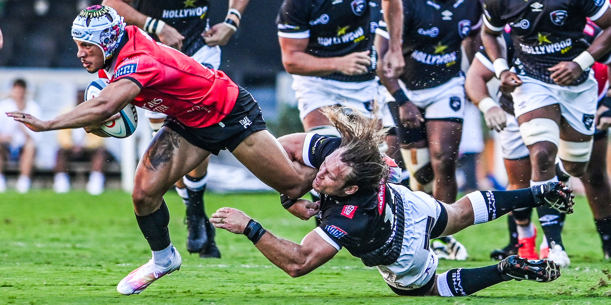 Edwill vd Merwe is tackled by Werner Kok the last time the Emirates Lions and Hollywoodbets Sharks clashed.