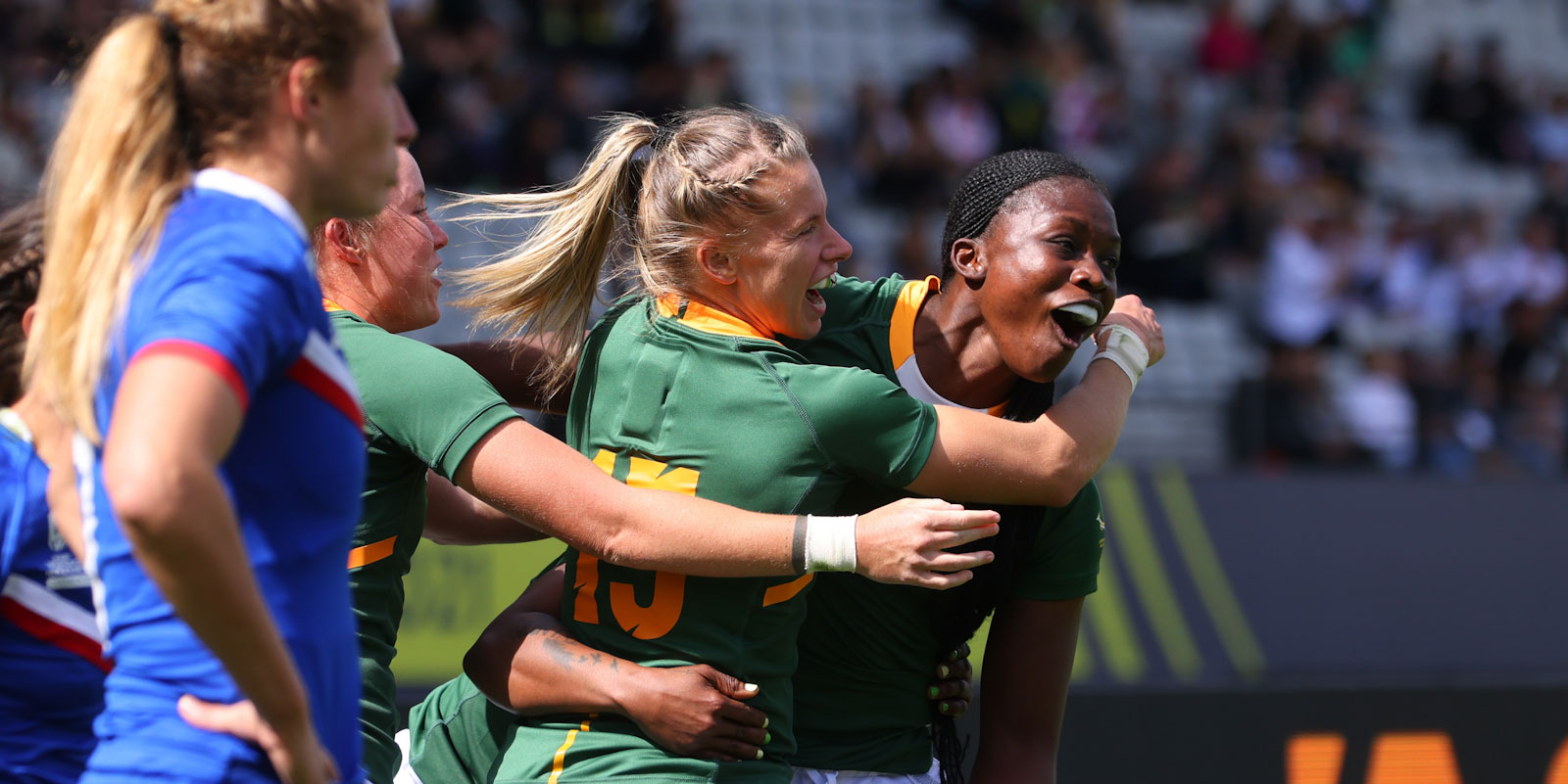 Nomawethu Mabenge scored their first try at the RWC in New Zealand, much to the delight of Tayla Kinsey and Nadine Roos.
