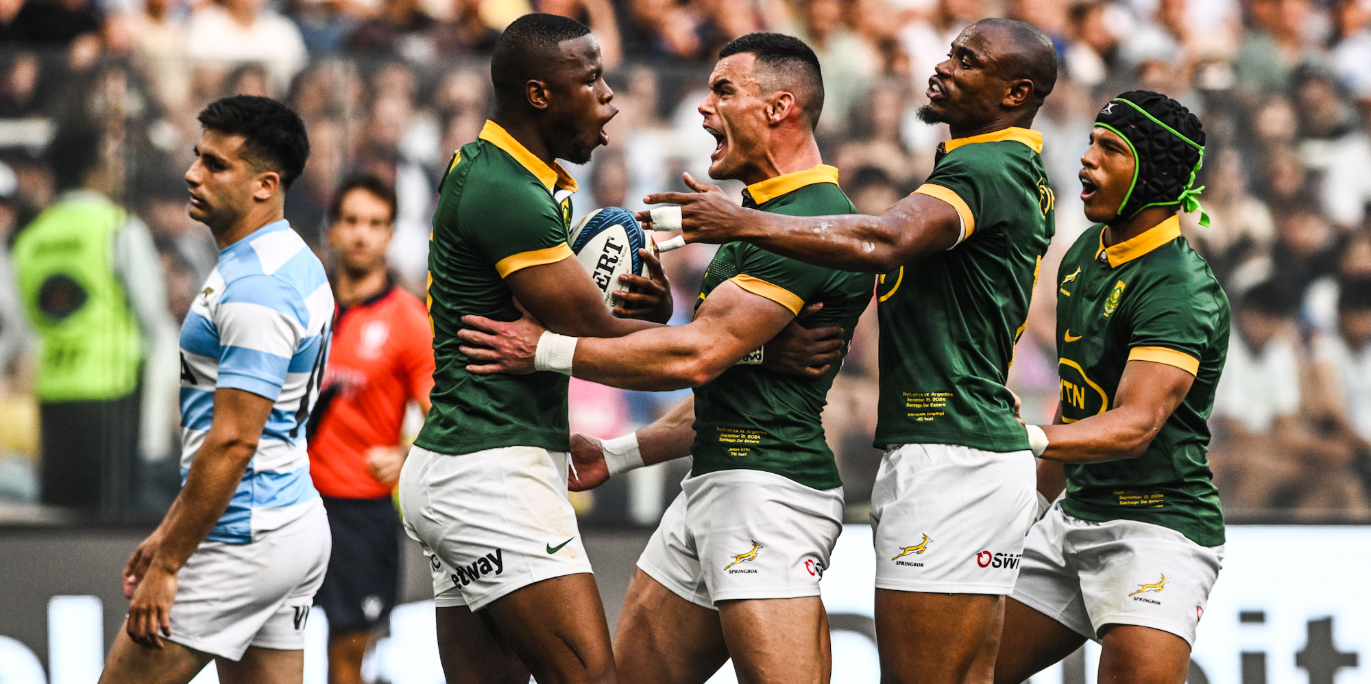 The Boks celebrate Aphelele Fassi's early try.