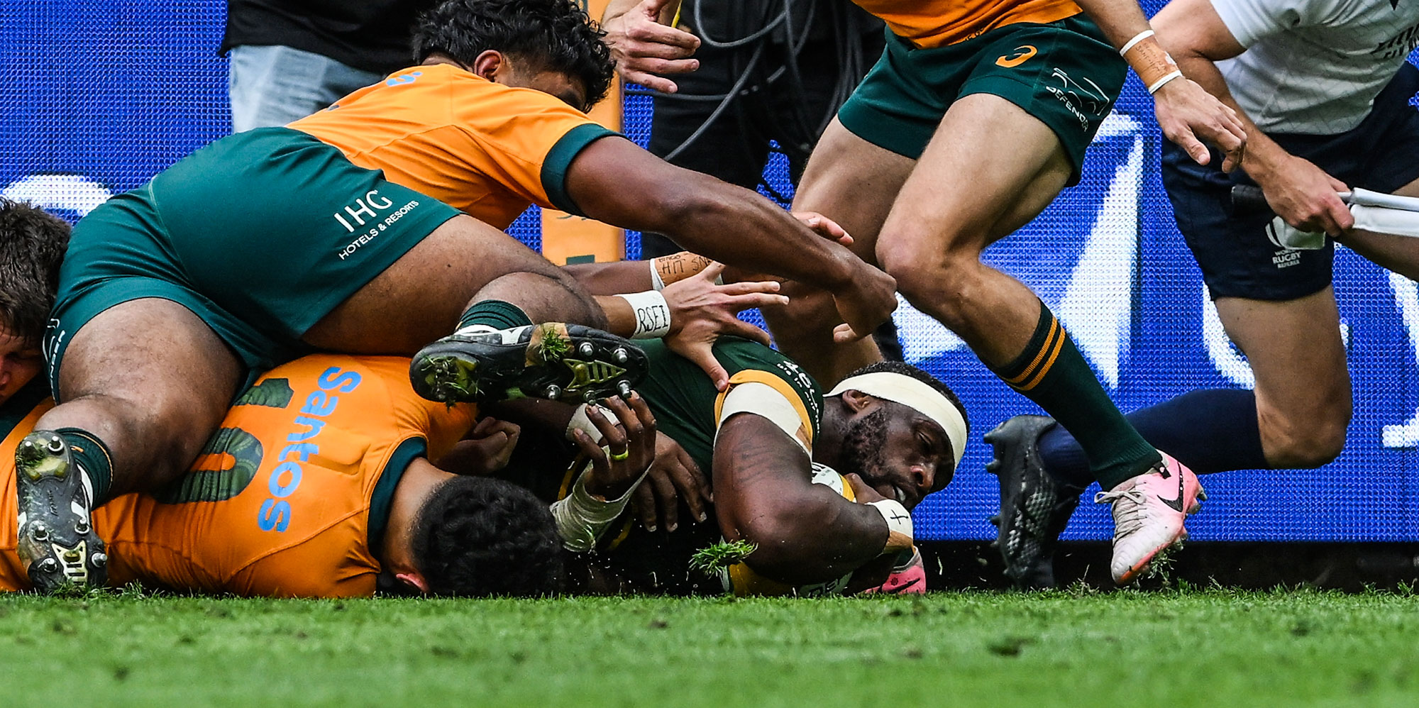 Siya Kolisi goes over for the first try of the Test.